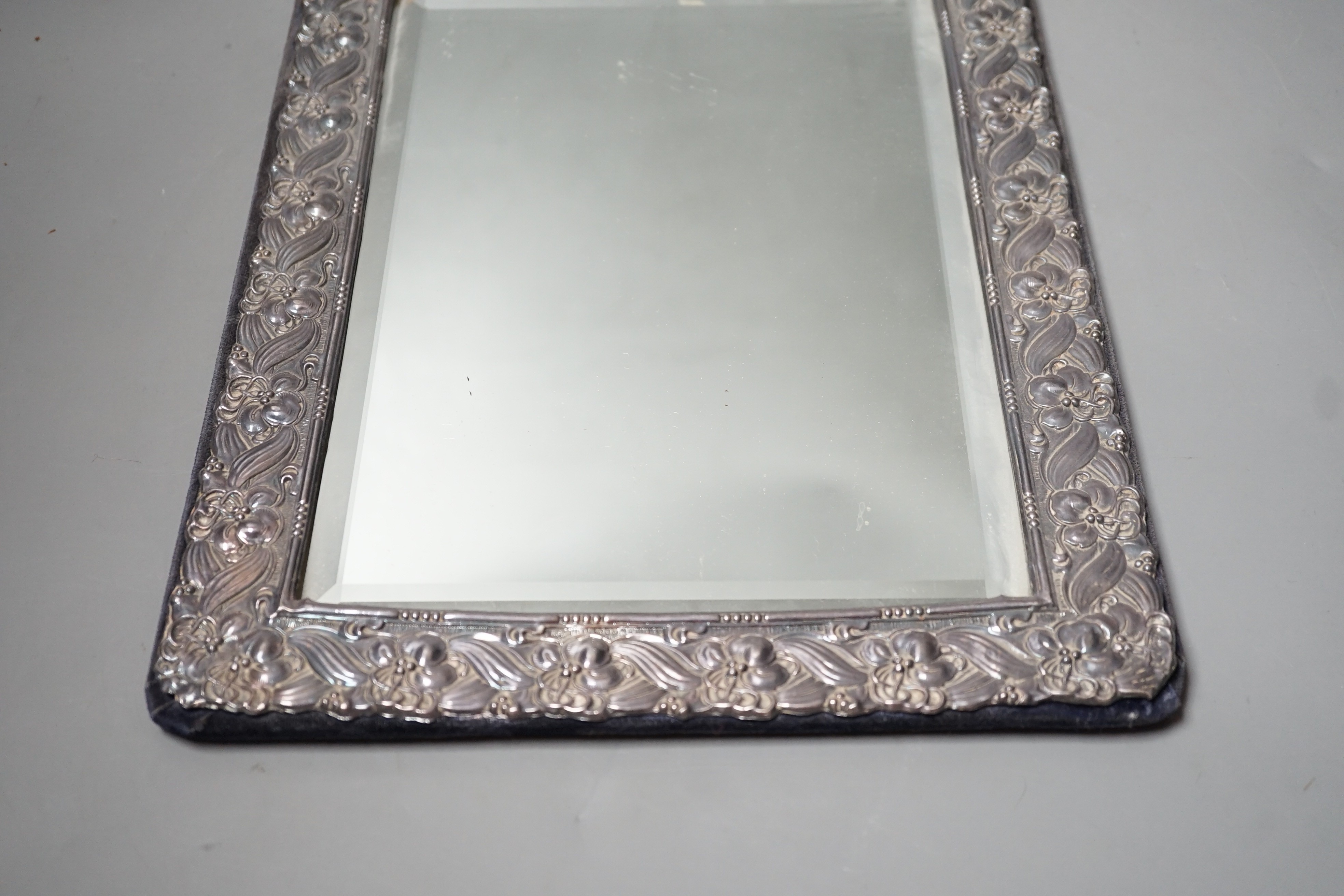 A modern repousse silver mounted rectangular photograph frame, Keyford Frames Ltd, London, 1988, 36.6cm.